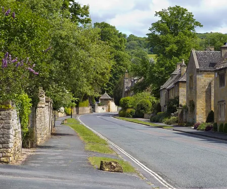 Oxfordshire street lined with trees in an urban development
